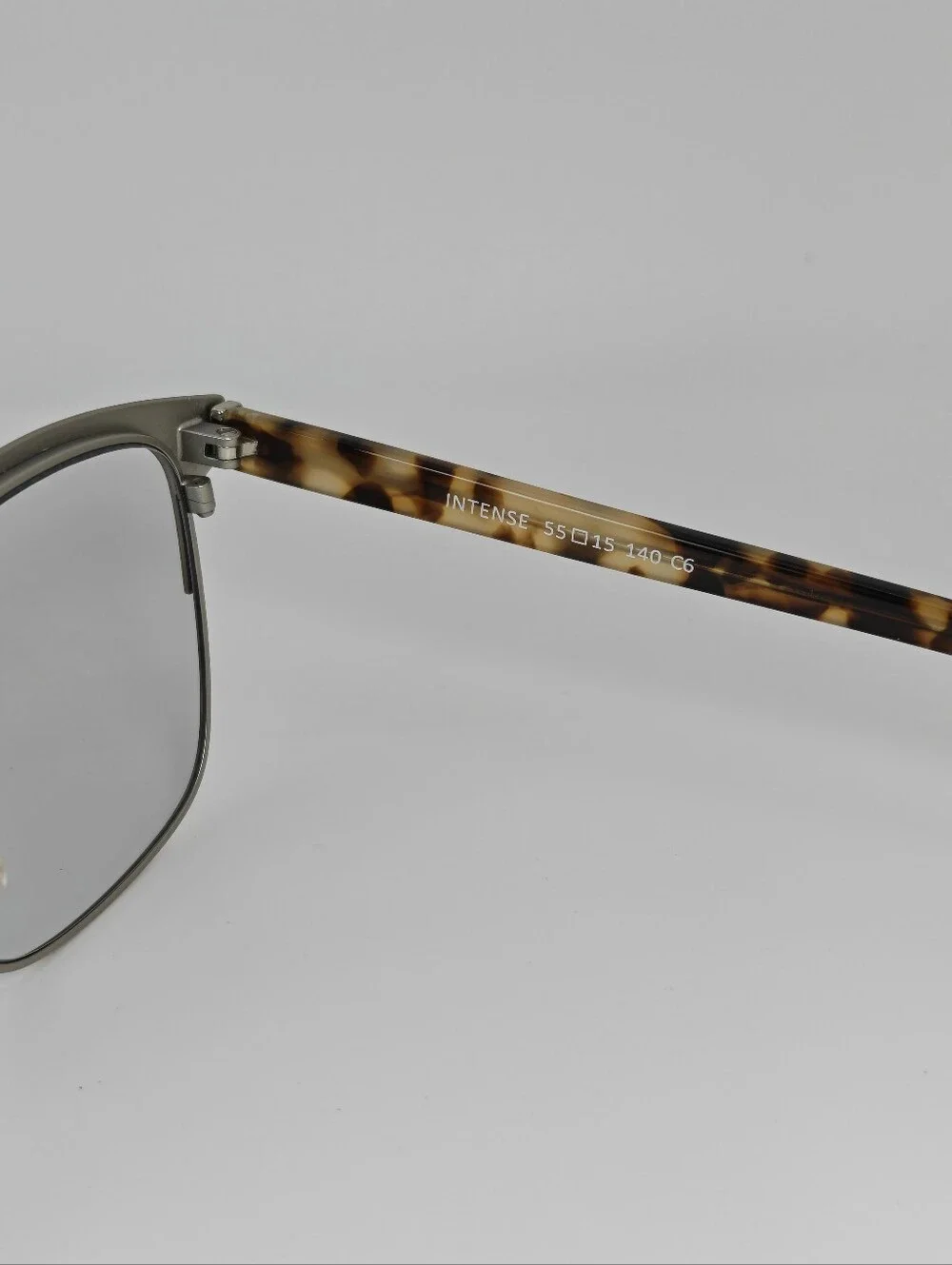 Intense. Brushed Silver Front, Bone Tortoise Temples. Women's.